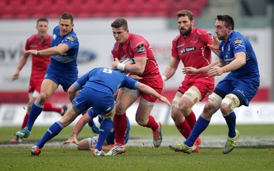 070315 - Scarlets v Leinster - Guinness PRO12 - Scott Williams of Scarlets is tackled by Eoin Reddan and Jack Conan of Leinster