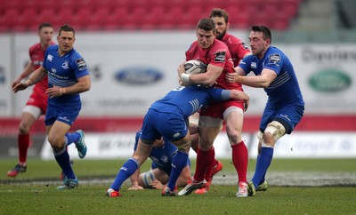 070315 - Scarlets v Leinster - Guinness PRO12 - Scott Williams of Scarlets is tackled by Eoin Reddan and Jack Conan of Leinster