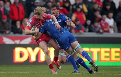 070315 - Scarlets v Leinster - Guinness PRO12 - Aled Davies of Scarlets is tackled by Dominic Ryan of Leinster