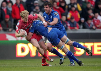 070315 - Scarlets v Leinster - Guinness PRO12 - Aled Davies of Scarlets is tackled by Dominic Ryan of Leinster