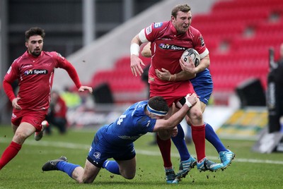 070315 - Scarlets v Leinster - Guinness PRO12 - Hadleigh Parkes of Scarlets is tackled by Fergus McFadden of Leinster