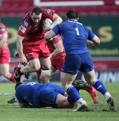 070315 - Scarlets v Leinster - Guinness PRO12 - Ken Owens of Scarlets jumps out of the tackle