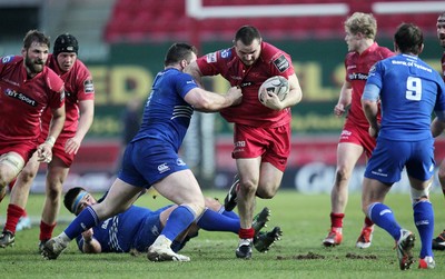 070315 - Scarlets v Leinster - Guinness PRO12 - Ken Owens of Scarlets is tackled by Cian Healy of Leinster