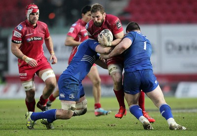 070315 - Scarlets v Leinster - Guinness PRO12 - John Barclay of Scarlets is tackled by Jack Conan and Cian Healy of Leinster