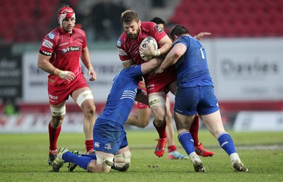 070315 - Scarlets v Leinster - Guinness PRO12 - John Barclay of Scarlets is tackled by Jack Conan and Cian Healy of Leinster