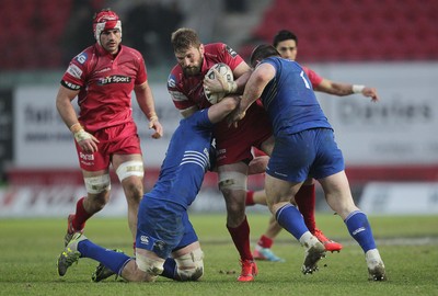 070315 - Scarlets v Leinster - Guinness PRO12 - John Barclay of Scarlets is tackled by Jack Conan and Cian Healy of Leinster