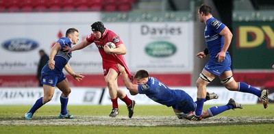 070315 - Scarlets v Leinster - Guinness PRO12 - James Davies of Scarlets is tackled by Dominic Ryan of Leinster