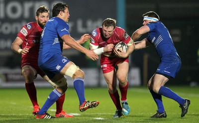 070315 - Scarlets v Leinster - Guinness PRO12 - Hadleigh Parkes of Scarlets is tackled by Mike McCarthy and Fergus McFadden of Leinster