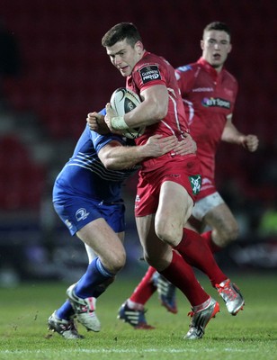 070315 - Scarlets v Leinster - Guinness PRO12 - Scott Williams of Scarlets is tackled by Zane Kirchner of Leinster