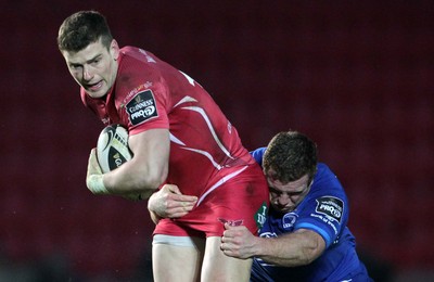 070315 - Scarlets v Leinster - Guinness PRO12 - Scott Williams of Scarlets is tackled by Zane Kirchner of Leinster