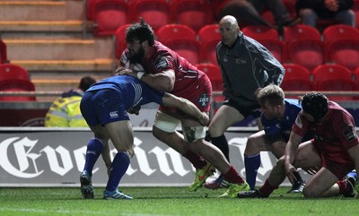 070315 - Scarlets v Leinster - Guinness PRO12 - Rory Pitman of Scarlets battles through to score a try