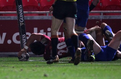 070315 - Scarlets v Leinster - Guinness PRO12 - Rory Pitman of Scarlets battles through to score a try