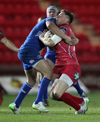 070315 - Scarlets v Leinster - Guinness PRO12 - Rhys Priestland of Scarlets is tackled by Zane Kirchner of Leinster