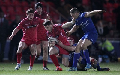 070315 - Scarlets v Leinster - Guinness PRO12 - Adam Warren of Scarlets is tackled by Josh Van Der Flier and Jimmy Gopperth of Leinster