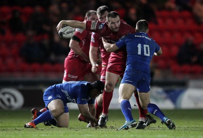 070315 - Scarlets v Leinster - Guinness PRO12 - Ken Owens of Scarlets is tackled by Jimmy Gopperth of Leinster