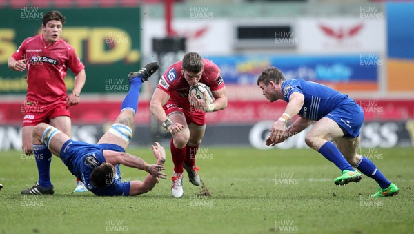 070315 - Scarlets v Leinster - Guinness PRO12 - Scott Williams of Scarlets slips past Dominic Ryan of Leinster