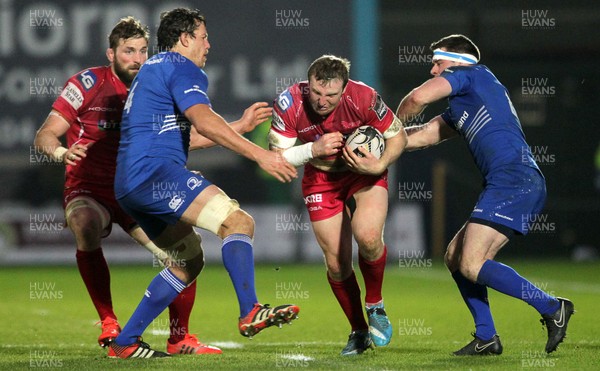 070315 - Scarlets v Leinster - Guinness PRO12 - Hadleigh Parkes of Scarlets is tackled by Mike McCarthy and Fergus McFadden of Leinster