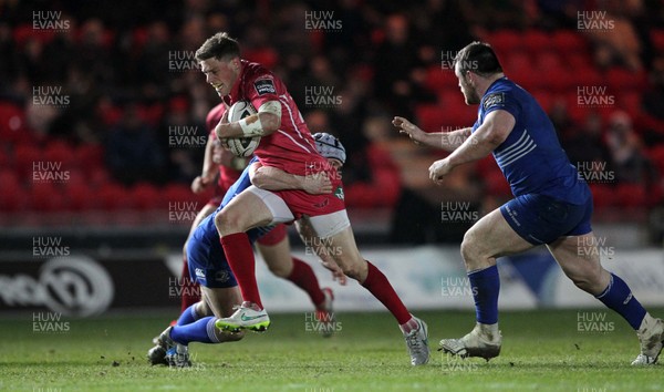 070315 - Scarlets v Leinster - Guinness PRO12 - Rhys Priestland of Scarlets is tackled by Luke Fitzgerald of Leinster