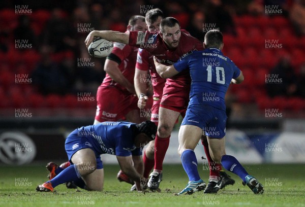 070315 - Scarlets v Leinster - Guinness PRO12 - Ken Owens of Scarlets is tackled by Jimmy Gopperth of Leinster