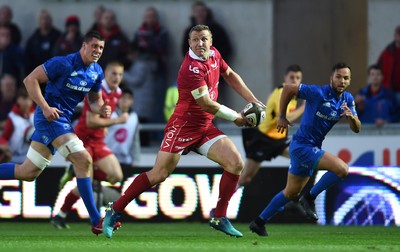 080918 - Scarlets v Leinster - Guinness PRO14 - Hadleigh Parkes of Scarlets gets clear