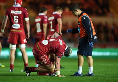 080918 - Scarlets v Leinster - Guinness PRO14 - Jake Ball of Scarlets receives treatment