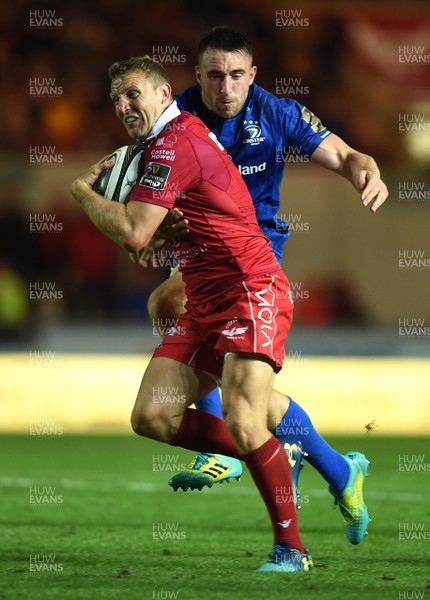 080918 - Scarlets v Leinster - Guinness PRO14 - Hadleigh Parkes of Scarlets gets into space