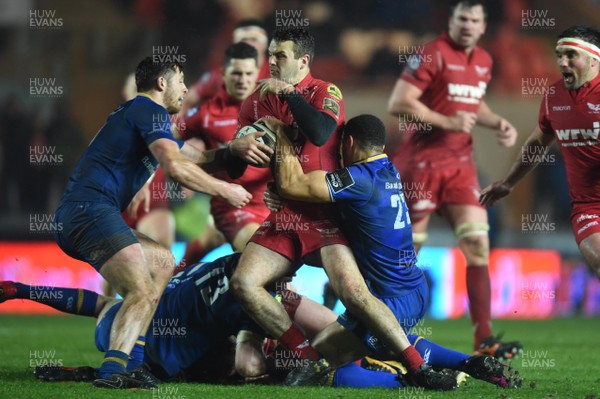 090318 - Scarlets v Leinster - Guinness PRO14 - Paul Asquith of Scarlets is tackled by Adam Byrne of Leinster