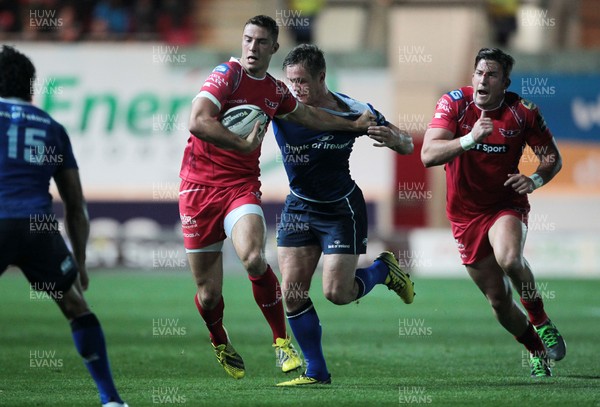 161015 - Scarlets v Leinster - Guinness PRO12 - Steven Shingler of Scarlets is tackled by Colm O'Shea of Leinster