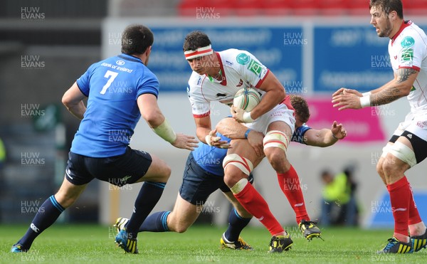 201012 - Scarlets v Leinster - Heineken Cup -Aaron Shingler of Scarlets is tackled by Sean Cronin of Leinster