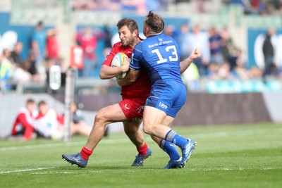 260425 - Scarlets v Leinster - United Rugby Championship - Alec Hepburn of Scarlets is tackled by Liam Turner of Leinster