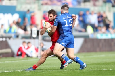260425 - Scarlets v Leinster - United Rugby Championship - Alec Hepburn of Scarlets is tackled by Liam Turner of Leinster