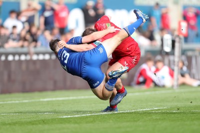 260425 - Scarlets v Leinster - United Rugby Championship - Alec Hepburn of Scarlets is tackled by Liam Turner of Leinster