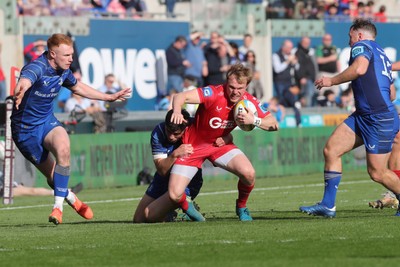 260425 - Scarlets v Leinster - United Rugby Championship - Blair Murray of Scarlets is tackled by Jimmy O’Brien of Leinster 