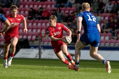 260425 - Scarlets v Leinster - United Rugby Championship - Sam Costelow of Scarlets with Ellis Mee in support