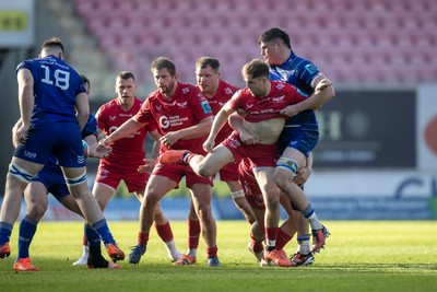 260425 - Scarlets v Leinster - United Rugby Championship - Ioan Lloyd of Scarlets is held up by Alex Soroka of Leinster 