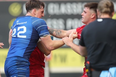 260425 - Scarlets v Leinster - United Rugby Championship - tempers flare between Charlie Tector of Leinster and Joe Roberts of Scarlets