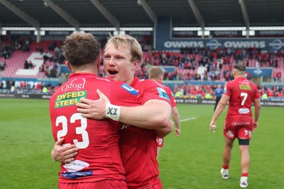 260425 - Scarlets v Leinster - United Rugby Championship - Macs Page and Blair Murray of Scarlets at the final whistle 