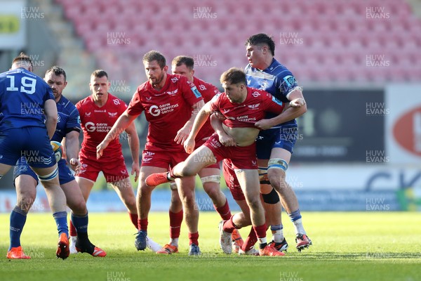 260425 - Scarlets v Leinster - United Rugby Championship - Ioan Lloyd of Scarlets is held up by Alex Soroka of Leinster 