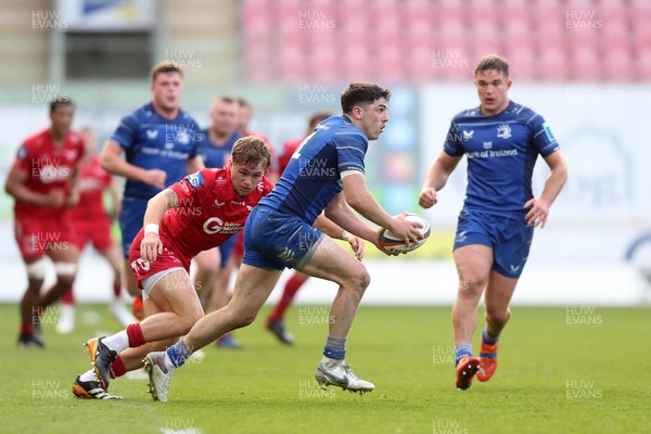 260425 - Scarlets v Leinster - United Rugby Championship - Jimmy O’Brien of Leinster looks for a way past Macs Page of Scarlets 