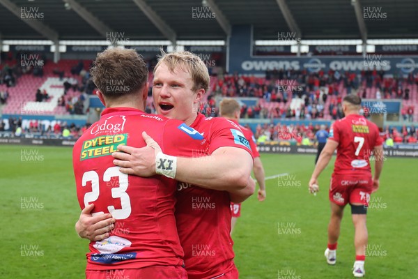 260425 - Scarlets v Leinster - United Rugby Championship - Macs Page and Blair Murray of Scarlets at the final whistle 