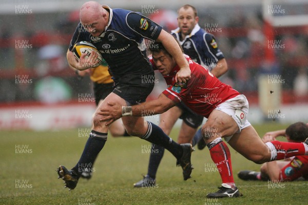 29.03.08 Llanelli v Leinster... Leinster's Bernard Jackman is tackled by Llanelli's Mahonri Schwalger. 