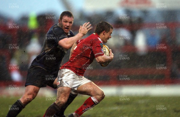 29.03.08 Llanelli v Leinster... Llanelli's Dwayne Peel takes on Leinster's Stephen Keogh. 