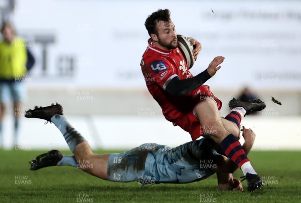 300121 - Scarlets v Leinster - Guinness PRO14 - Ryan Conbeer of Scarlets is tackled by Liam Turner of Leinster