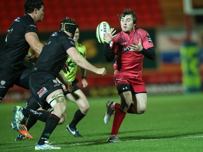 310115 - Scarlets v London Irish, LV= Cup - Scarlets Rhodri Williams is closed down by London Irish's Conor Gilsenan