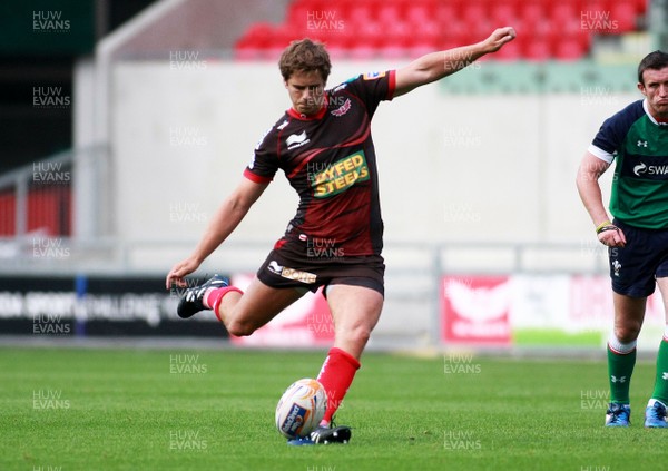 250812 Scarlets v London Welsh - Pre-season warm up -Scarlets' Aled Thomas kicks a goal