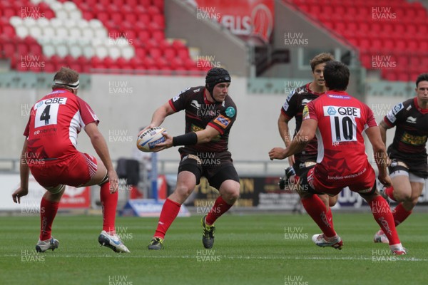 250812 - Scarlets v London Welsh - Preseason Friendly - Johnathan Edwards feeds on his 100th game for the Scarlets