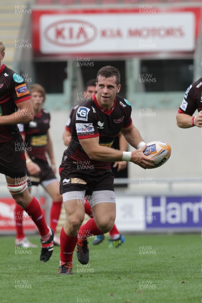 250812 - Scarlets v London Welsh - Preseason Friendly - Scarlets Gareth Davies looks for support