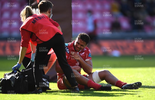 101021 - Scarlets v Munster - United Rugby Championship - Dan Davis of Scarlets is treated by medical staff
