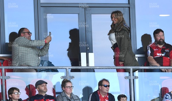101021 - Scarlets v Munster - United Rugby Championship - Carol Vorderman watches the game with singer and actor Wynne Evans