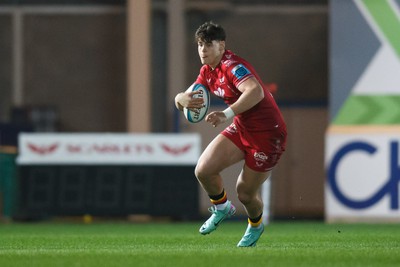 160224 - Scarlets v Munster - United Rugby Championship - Eddie James of Scarlets makes a break